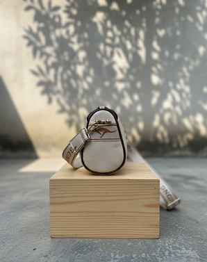 Cream with elephant sling bag